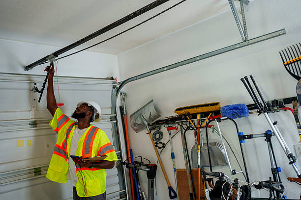 Professional Garage Door Panel Replacement technician working in Macon, IL